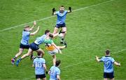 28 April 2024; Keith O'Neill of Offaly has his shot blocked down by Theo Clancy of Dublin during the Leinster GAA Football Senior Championship semi-final match between Dublin and Offaly at Croke Park in Dublin. Photo by Piaras Ó Mídheach/Sportsfile