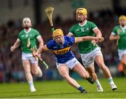 28 April 2024; Sean Hayes of Tipperary in action against Tom Morrissey of Limerick during the Munster GAA Hurling Senior Championship Round 2 match between Limerick and Tipperary at TUS Gaelic Grounds in Limerick. Photo by Tom Beary/Sportsfile