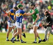 28 April 2024; Noel McGrath of Tipperary, left, and Diarmaid Byrnes of Limerick after the final whistle of the Munster GAA Hurling Senior Championship Round 2 match between Limerick and Tipperary at TUS Gaelic Grounds in Limerick. Photo by Brendan Moran/Sportsfile