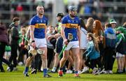 28 April 2024; Dejected Tipperary players Eoghan Connolly, left, and Conor Bowe leave the pitch after the Munster GAA Hurling Senior Championship Round 2 match between Limerick and Tipperary at TUS Gaelic Grounds in Limerick. Photo by Brendan Moran/Sportsfile