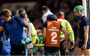 28 April 2024; Peter Casey of Limerick is assisted from the field by medical staff after picking up an injury while scoring his sides second during the Munster GAA Hurling Senior Championship Round 2 match between Limerick and Tipperary at TUS Gaelic Grounds in Limerick. Photo by Tom Beary/Sportsfile