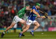 28 April 2024; Noel McGrath of Tipperary is tackled by William O'Donoghue of Limerick during the Munster GAA Hurling Senior Championship Round 2 match between Limerick and Tipperary at TUS Gaelic Grounds in Limerick. Photo by Tom Beary/Sportsfile