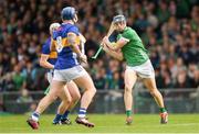 28 April 2024; David Reidy of Limerick scores a point during the Munster GAA Hurling Senior Championship Round 2 match between Limerick and Tipperary at TUS Gaelic Grounds in Limerick. Photo by Tom Beary/Sportsfile
