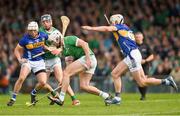 28 April 2024; Aaron Gillane of Limerick in action against Bryan O'Mara of Tipperary during the Munster GAA Hurling Senior Championship Round 2 match between Limerick and Tipperary at TUS Gaelic Grounds in Limerick. Photo by Tom Beary/Sportsfile