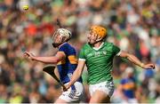 28 April 2024; Eoghan Connolly of Tipperary in action against Adam English of Limerick during the Munster GAA Hurling Senior Championship Round 2 match between Limerick and Tipperary at TUS Gaelic Grounds in Limerick. Photo by Tom Beary/Sportsfile