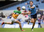 28 April 2024; Michael Fitzsimons of Dublin in action against Jack McEvoy of Offaly during the Leinster GAA Football Senior Championship semi-final match between Dublin and Offaly at Croke Park in Dublin. Photo by Shauna Clinton/Sportsfile