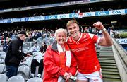 28 April 2024; Conor Grimes of Louth celebrates with supporter Marie Lynch, from Dundalk, after the Leinster GAA Football Senior Championship semi-final match between Kildare and Louth at Croke Park in Dublin. Photo by Piaras Ó Mídheach/Sportsfile