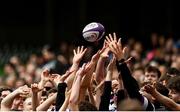 28 April 2024; Supporters catch the ball during the Energia All-Ireland League Men's Division 1A final match between Terenure College and Cork Constitution at the Aviva Stadium in Dublin. Photo by Seb Daly/Sportsfile