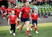 28 April 2024; UL Bohemian captain Chloe Pearse leads her side out before the Energia All-Ireland League Women's Division 1 final match between UL Bohemian and Railway Union at the Aviva Stadium in Dublin. Photo by Seb Daly/Sportsfile