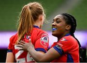 28 April 2024; Eabha Nic Dhonncha of UL Bohemian, left, is congratulated by teammate Chisom Ugwueru after scoring their side's third try during the Energia All-Ireland League Women's Division 1 final match between UL Bohemian and Railway Union at the Aviva Stadium in Dublin. Photo by Seb Daly/Sportsfile