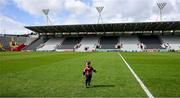28 April 2024; Two year old Jack Horgan, son of Patrick Horgan of Cork, runs accross the field after the Munster GAA Hurling Senior Championship Round 2 match between Cork and Clare at SuperValu Páirc Ui Chaoimh in Cork. Photo by Ray McManus/Sportsfile