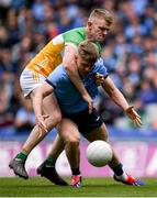 28 April 2024; Cian Murphy of Dublin is tackled by David Dempsey of Offaly during the Leinster GAA Football Senior Championship semi-final match between Dublin and Offaly at Croke Park in Dublin. Photo by Shauna Clinton/Sportsfile