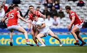 28 April 2024; Jack Sargent of Kildare in action against Louth players, from left, Ciarán Downey, Ryan Burns and Anthony Williams during the Leinster GAA Football Senior Championship semi-final match between Kildare and Louth at Croke Park in Dublin. Photo by Piaras Ó Mídheach/Sportsfile