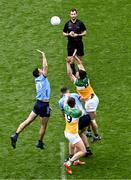 28 April 2024; Referee Paul Faloon looks on as Ross McGarry, left, and Brian Fenton of Dublin and Jack McEvoy and Eoin Carroll, right, of Offaly contest the throw-in at the start of the second half during the Leinster GAA Football Senior Championship semi-final match between Dublin and Offaly at Croke Park in Dublin. Photo by Piaras Ó Mídheach/Sportsfile