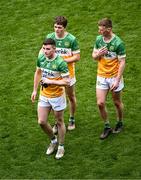 28 April 2024; Offaly players from left, Dylan Hyland, John Furlong and Peter Cunningham leave the pitch after their side's defeat in the Leinster GAA Football Senior Championship semi-final match between Dublin and Offaly at Croke Park in Dublin. Photo by Piaras Ó Mídheach/Sportsfile