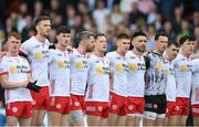 28 April 2024; Tyrone players stand for the playing of the National Anthem before the Ulster GAA Football Senior Championship semi-final match between Donegal and Tyrone at Celtic Park in Derry. Photo by Stephen McCarthy/Sportsfile