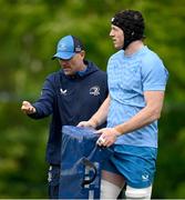 29 April 2024; Senior coach Jacques Nienaber, left, and Ryan Baird during Leinster rugby squad training at UCD in Dublin. Photo by Brendan Moran/Sportsfile
