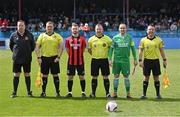 28 April 2024; Officials and team captains, from left, fourth official Declan Fogarty, assistant referee Daniel Daunt, Anthony McAlavey of Ringmahon Rangers, referee Vincent Coonan, Oisin Coleman of Glebe North and assistant referee Jason Mannix before  the FAI Intermediate Cup Final between Glebe North FC of the Leinster Senior League and Ringmahon Rangers FC of the Munster Senior League at Weaver's Park in Drogheda, Louth. Photo by Ben McShane/Sportsfile