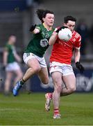 29 April 2024; Kieran McArdle of Louth in action against Shaun Leonard of Meath during the EirGrid Leinster GAA Football U20 Championship Final match between Meath and Louth at Parnell Park in Dublin. Photo by Piaras Ó Mídheach/Sportsfile