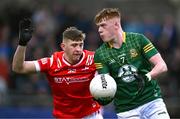 29 April 2024; Killian Smyth of Meath in action against Ronan Deery of Louth during the EirGrid Leinster GAA Football U20 Championship Final match between Meath and Louth at Parnell Park in Dublin. Photo by Piaras Ó Mídheach/Sportsfile