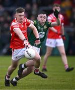 29 April 2024; Ronan Deery of Louth in action against Hughie Corcoran of Meath during the EirGrid Leinster GAA Football U20 Championship Final match between Meath and Louth at Parnell Park in Dublin. Photo by Piaras Ó Mídheach/Sportsfile
