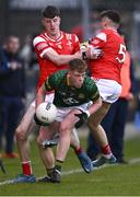 29 April 2024; Killian Smyth of Meath in action against Dara McDonnell, left, and Tadhg McDonnell of Louth during the EirGrid Leinster GAA Football U20 Championship Final match between Meath and Louth at Parnell Park in Dublin. Photo by Piaras Ó Mídheach/Sportsfile