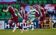 29 April 2024; Aaron Greene of Shamrock Rovers in action against Oisin Gallagher of Drogheda United during the SSE Airtricity Men's Premier Division match between Shamrock Rovers and Drogheda United at Tallaght Stadium in Dublin. Photo by Stephen McCarthy/Sportsfile