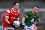 29 April 2024; Kieran McArdle of Louth in action against Conor Ennis of Meath during the EirGrid Leinster GAA Football U20 Championship Final match between Meath and Louth at Parnell Park in Dublin. Photo by Piaras Ó Mídheach/Sportsfile