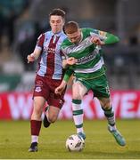 29 April 2024; Darragh Nugent of Shamrock Rovers in action against Warren Davis of Drogheda United during the SSE Airtricity Men's Premier Division match between Shamrock Rovers and Drogheda United at Tallaght Stadium in Dublin. Photo by Stephen McCarthy/Sportsfile