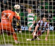 29 April 2024; Darragh Burns of Shamrock Rovers shoots to score his side's third goal past Drogheda United goalkeeper Jethren Barr during the SSE Airtricity Men's Premier Division match between Shamrock Rovers and Drogheda United at Tallaght Stadium in Dublin. Photo by Stephen McCarthy/Sportsfile