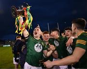29 April 2024; Meath captain Liam Kelly holds the cup aloft as he celebrates with team-mates after victory in the EirGrid Leinster GAA Football U20 Championship Final match between Meath and Louth at Parnell Park in Dublin. Photo by Piaras Ó Mídheach/Sportsfile