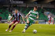 29 April 2024; Johnny Kenny of Shamrock Rovers in action against Jack Keaney of Drogheda United during the SSE Airtricity Men's Premier Division match between Shamrock Rovers and Drogheda United at Tallaght Stadium in Dublin. Photo by Stephen McCarthy/Sportsfile