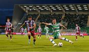 29 April 2024; Aaron Greene of Shamrock Rovers in action against Luke Heeney of Drogheda United during the SSE Airtricity Men's Premier Division match between Shamrock Rovers and Drogheda United at Tallaght Stadium in Dublin. Photo by Stephen McCarthy/Sportsfile