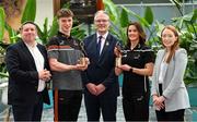 30 April 2024; PwC GAA/GPA Players of the Month for March, Derry footballer Eoin McEvoy, and Armagh ladies footballer Aimee Mackin with their awards, with Enda McDonagh, Managing Partner, PwC; Uachtarán Chumann Lúthchleas Gael Jarlath Burns, and GPA national executive committee co-chairperson Maria Kinsella; at PwC offices in Dublin today. Photo by Ramsey Cardy/Sportsfile