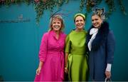 30 April 2024; Racegoers, from left, Marietta Doran, from Carlow, Jess Colivet, from Punchestown, and Roxanne Parker, from Dublin, during day one of the Punchestown Festival at Punchestown Racecourse in Kildare. Photo by David Fitzgerald/Sportsfile