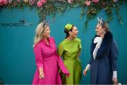 30 April 2024; Racegoers, from left, Marietta Doran, from Carlow, Jess Colivet, from Punchestown, and Roxanne Parker, from Dublin, during day one of the Punchestown Festival at Punchestown Racecourse in Kildare. Photo by David Fitzgerald/Sportsfile