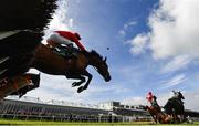 30 April 2024; Nusret, with JJ Slevin up, jump the last in the Killashee Hotel Handicap Hurdle during day one of the Punchestown Festival at Punchestown Racecourse in Kildare. Photo by David Fitzgerald/Sportsfile