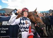 30 April 2024; JJ Slevin, left, celebrates with Banbridge after winning the William Hill Champion Steeplechase during day one of the Punchestown Festival at Punchestown Racecourse in Kildare.