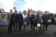 30 April 2024; Jockey JJ Slevin celebrates with winning connections after riding Banbridge to victory in the William Hill Champion Steeplechase during day one of the Punchestown Festival at Punchestown Racecourse in Kildare.