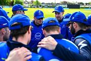 1 May 2024; George Dockrell of Leinster Lightning, right, speaks to his team in a huddle before the Cricket Ireland Inter-Provincial Trophy match between Leinster Lightning and Munster Reds at Pembroke Cricket Club in Dublin. Photo by Tyler Miller/Sportsfile