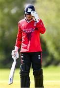 1 May 2024; Jordan Neil of Munster Reds reacts after being hit out by Barry McCarthy of Leinster Lightning during the Cricket Ireland Inter-Provincial Trophy match between Leinster Lightning and Munster Reds at Pembroke Cricket Club in Dublin. Photo by Tyler Miller/Sportsfile