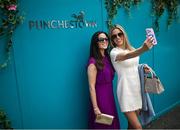 1 May 2024; Racegoers Eimear Riley Mahon, left, and Rosalind Lipsett from Dublin during day two of the Punchestown Festival at Punchestown Racecourse in Kildare. Photo by David Fitzgerald/Sportsfile
