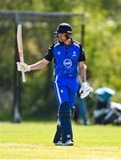 1 May 2024; Tim Tector of Leinster Lightning holds his bat aloft to supporters after reaching a half-century during the Cricket Ireland Inter-Provincial Trophy match between Leinster Lightning and Munster Reds at Pembroke Cricket Club in Dublin. Photo by Tyler Miller/Sportsfile