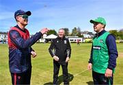 1 May 2024; Northern Knights captain Mark Adair, left, performs the cointoss alongside North West Warriors captain Andy McBrine and match official Graham McCrea before the Cricket Ireland Inter-Provincial Trophy match between Northern Knights and North West Warriors at Pembroke Cricket Club in Dublin. Photo by Tyler Miller/Sportsfile