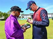 1 May 2024; Northern Knights captain Mark Adair inspects the match balls with Umpire Azam Baig before the Cricket Ireland Inter-Provincial Trophy match between Northern Knights and North West Warriors at Pembroke Cricket Club in Dublin. Photo by Tyler Miller/Sportsfile