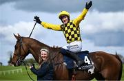 1 May 2024; Paul Townend celebrates on Dancing City with groom Brid O'Keeffe after winning the Channor Real Estate Group Novice Hurdle during day two of the Punchestown Festival at Punchestown Racecourse in Kildare. Photo by David Fitzgerald/Sportsfile