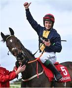 1 May 2024; JJ Slevin celebrates on Fastorslow with groom Therese Sweeney after winning the Ladbrokes Punchestown Gold Cup during day two of the Punchestown Festival at Punchestown Racecourse in Kildare. Photo by David Fitzgerald/Sportsfile