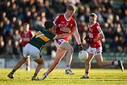 1 May 2024; Rory O’Shaughnessy of Cork is tackled by Cian Lynch of Kerry during the EirGrid Munster GAA U20 Football Championship Final match between Kerry and Cork at Austin Stack Park in Tralee, Kerry. Photo by Brendan Moran/Sportsfile