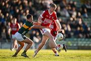 1 May 2024; Rory O’Shaughnessy of Cork is tackled by Cian Lynch of Kerry during the EirGrid Munster GAA U20 Football Championship Final match between Kerry and Cork at Austin Stack Park in Tralee, Kerry. Photo by Brendan Moran/Sportsfile