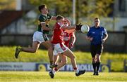 1 May 2024; Dara Sheedy of Cork is tackled by Cian Lynch of Kerry during the EirGrid Munster GAA U20 Football Championship Final match between Kerry and Cork at Austin Stack Park in Tralee, Kerry. Photo by Brendan Moran/Sportsfile